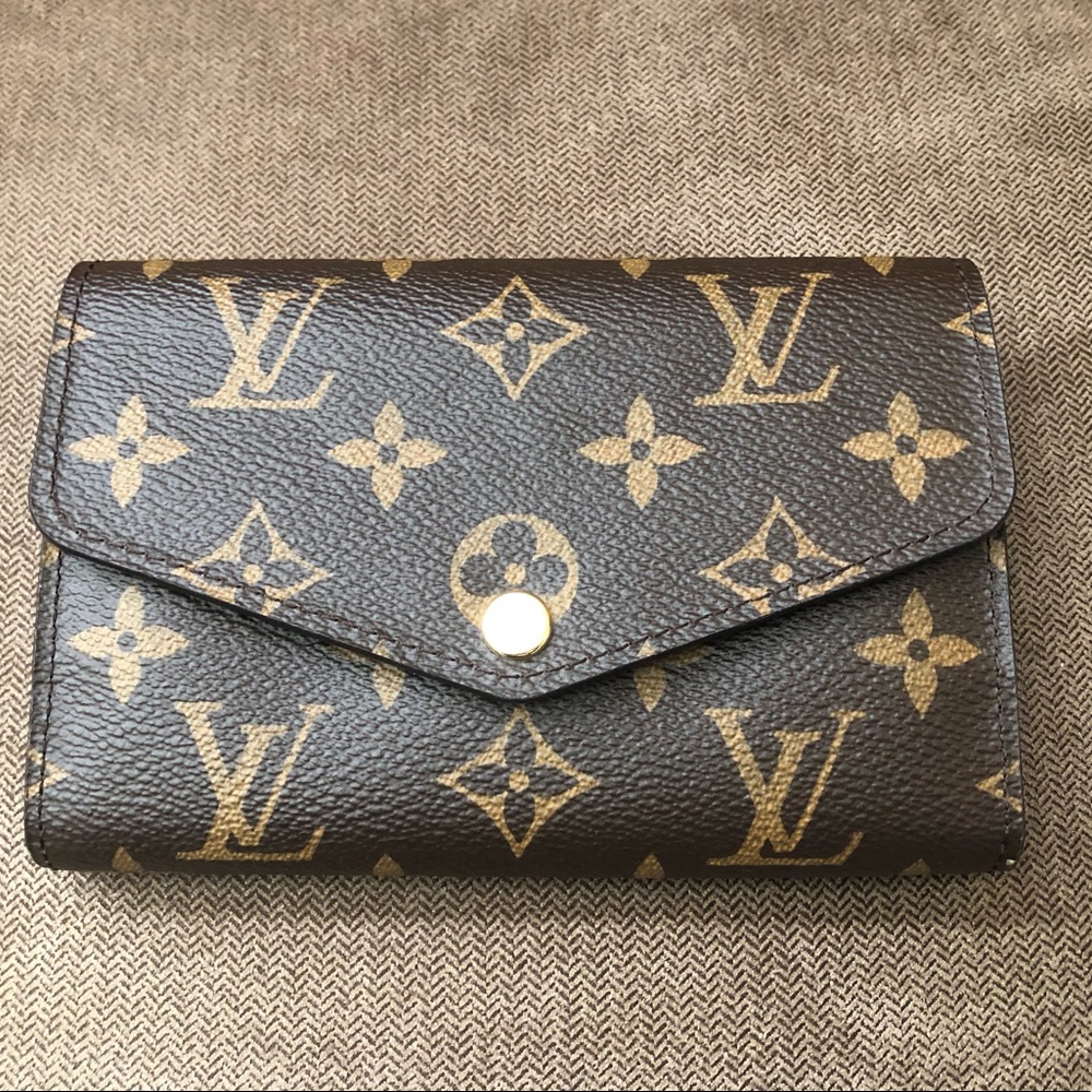 Authentic LV Sarah Compact wallet $400